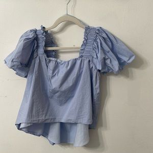 Baby blue ruffle high low blouse